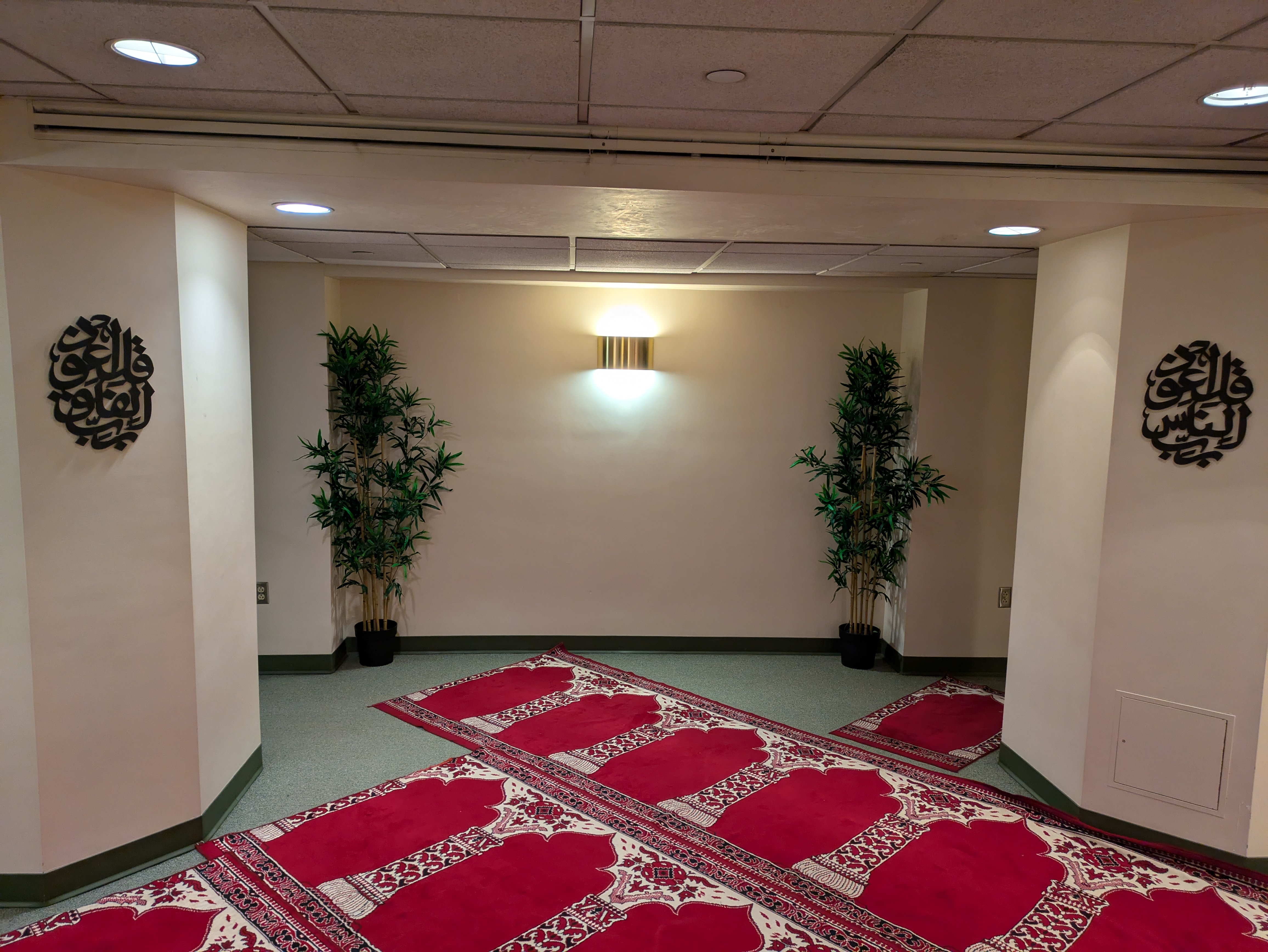 Prayer rugs laid out at the Musalla