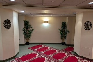 Prayer rugs laid out at the Musalla