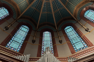 Stained glass windows in the dome of Battell, taken from below.