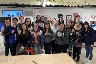 A large group of SBNH students inside a makerspace.
