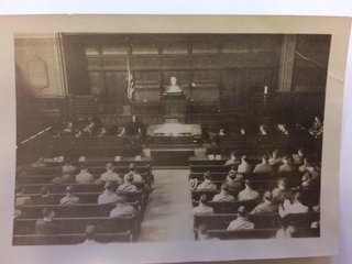 A black and white archival photo showing the last compulsary church service at Yale.